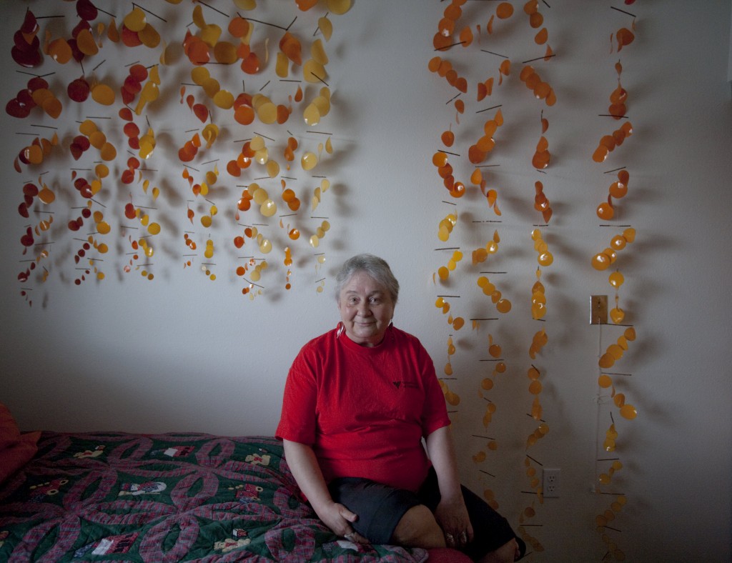 Candyce Scott with part of her sculpture "Goldsworthy In Motion."